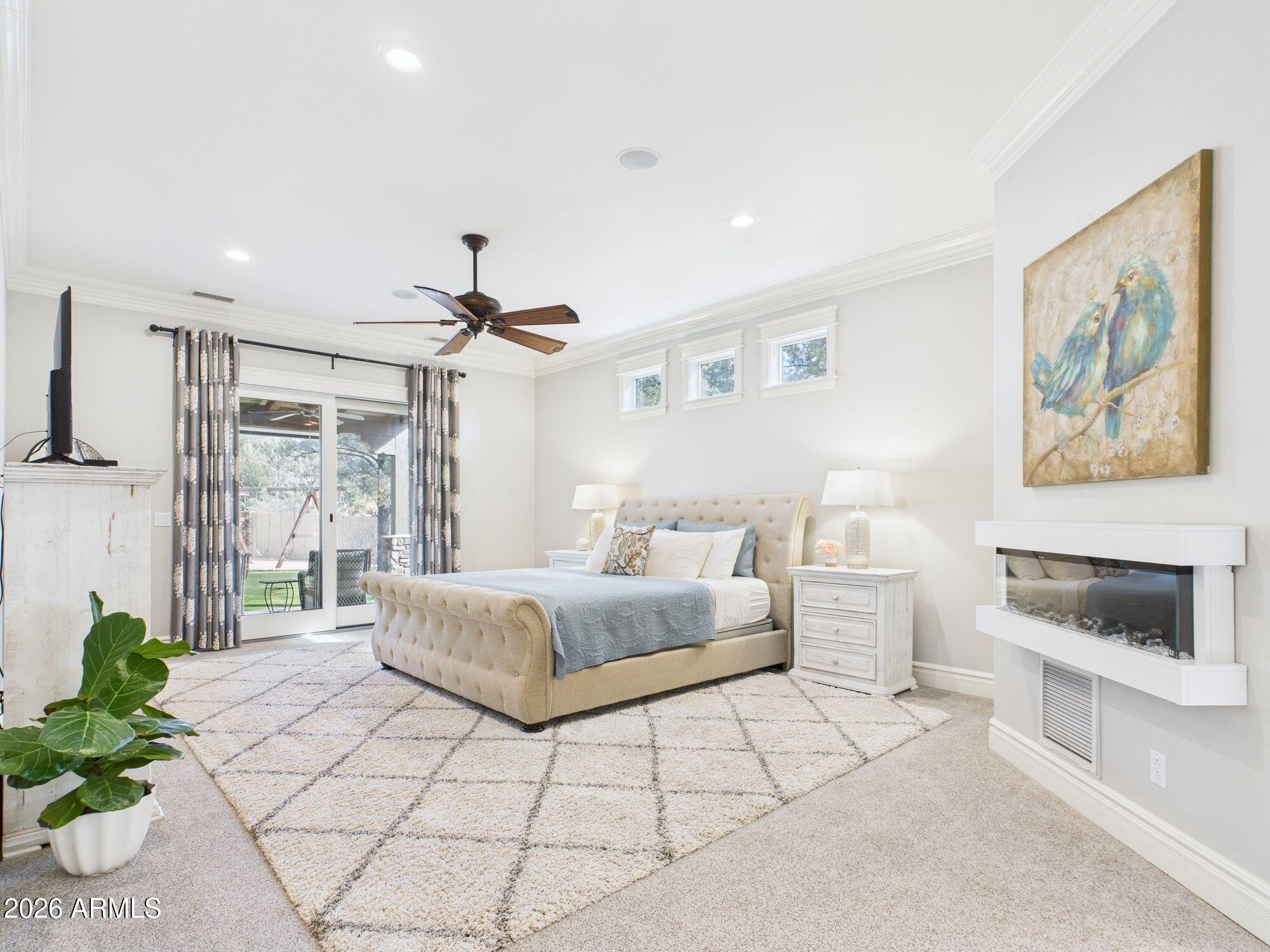 1006 West Rock Springs Circle Payson, AZ 85541 - Photo 12 of 35 a living room with furniture and a chandelier