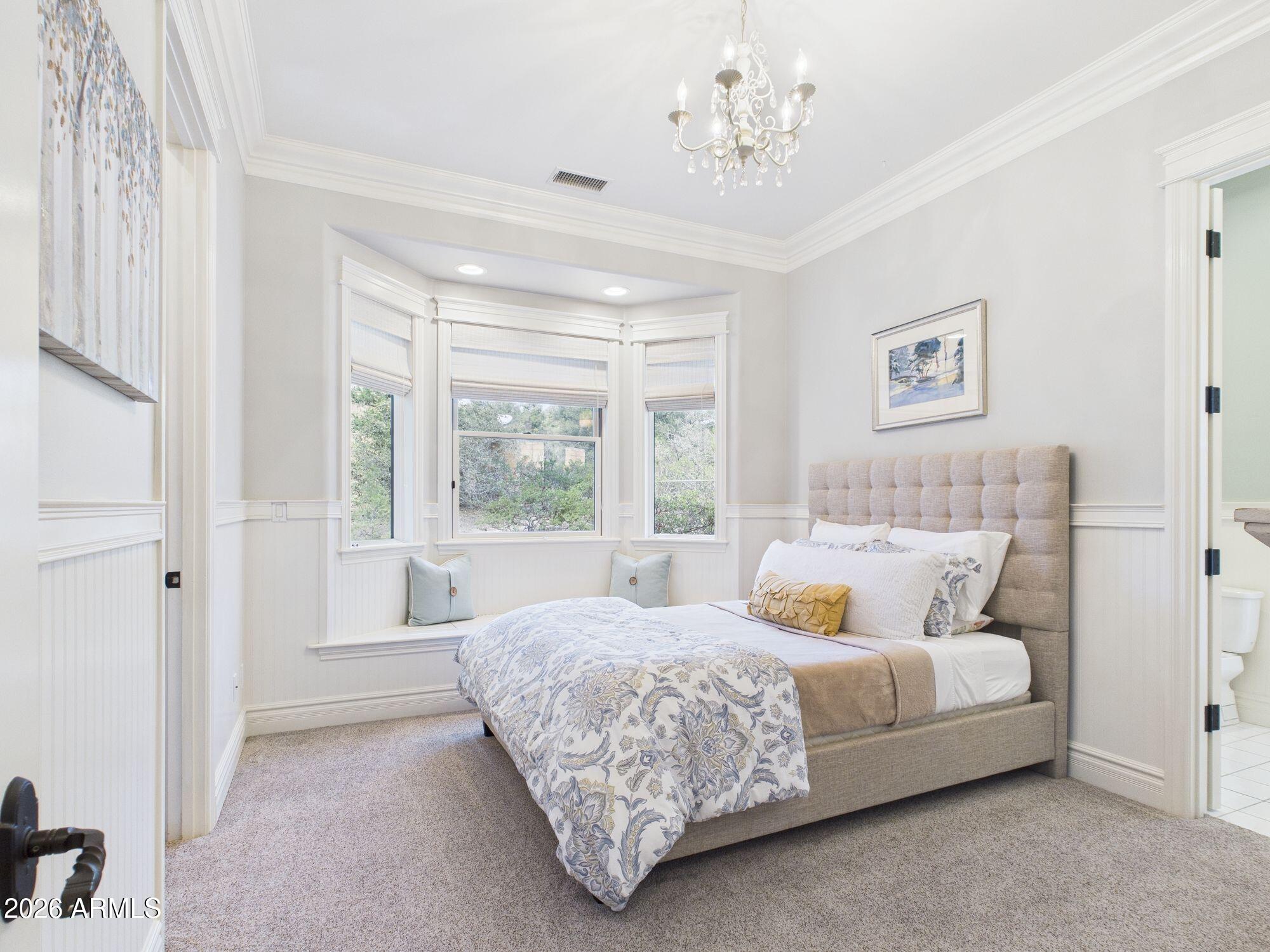 1006 West Rock Springs Circle Payson, AZ 85541 - Photo 16 of 35 a bedroom with a large bed and a window