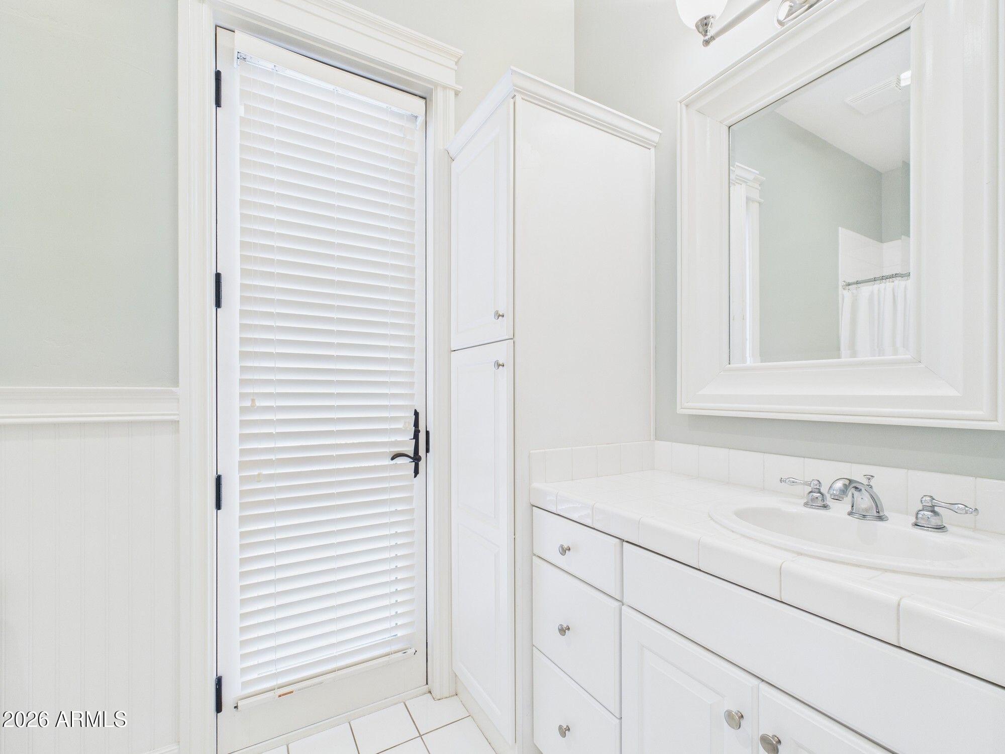 1006 West Rock Springs Circle Payson, AZ 85541 - Photo 17 of 35 a bathroom with a sink and a mirror