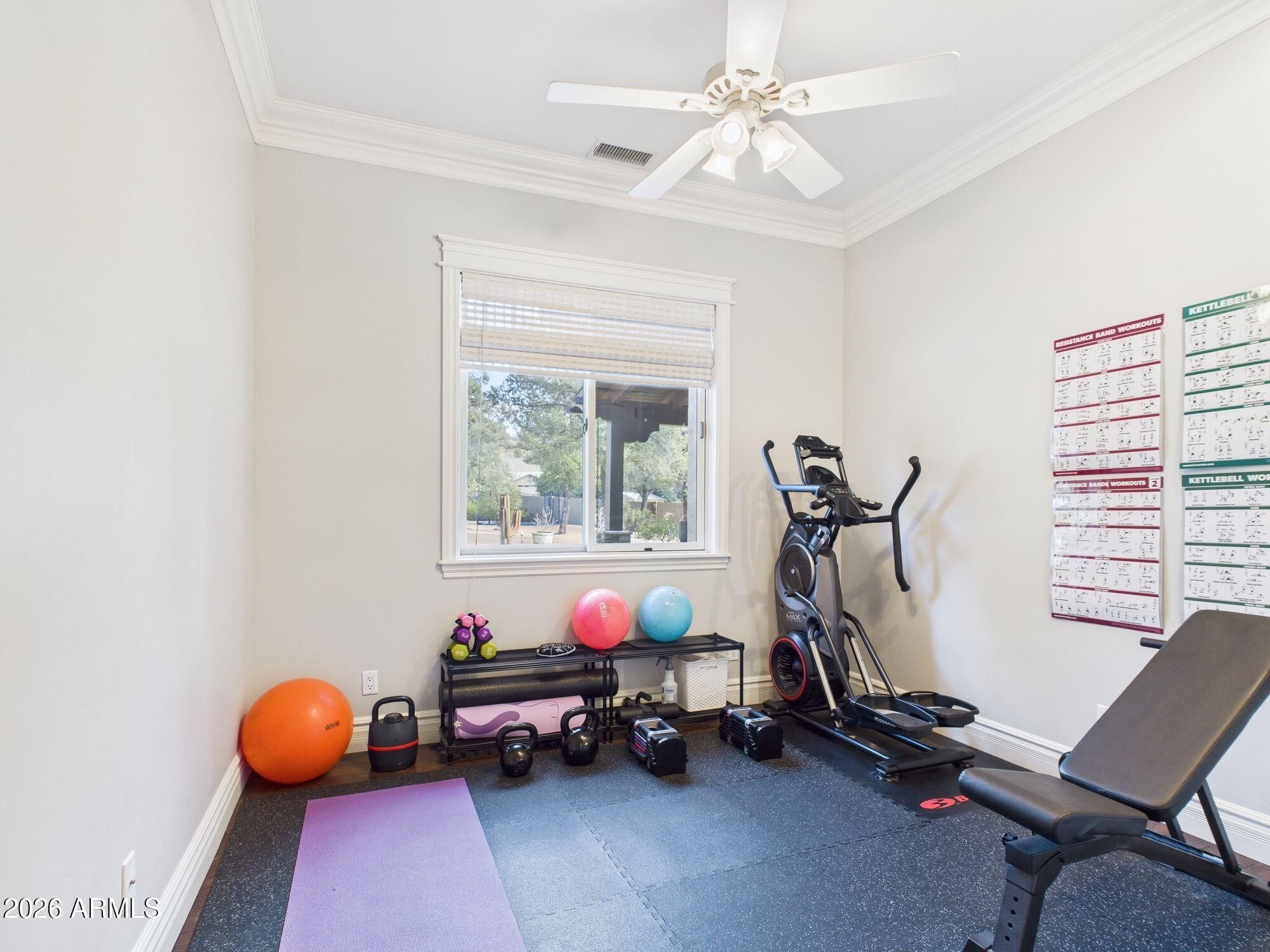 1006 West Rock Springs Circle Payson, AZ 85541 - Photo 21 of 35 a bedroom with furniture and a window