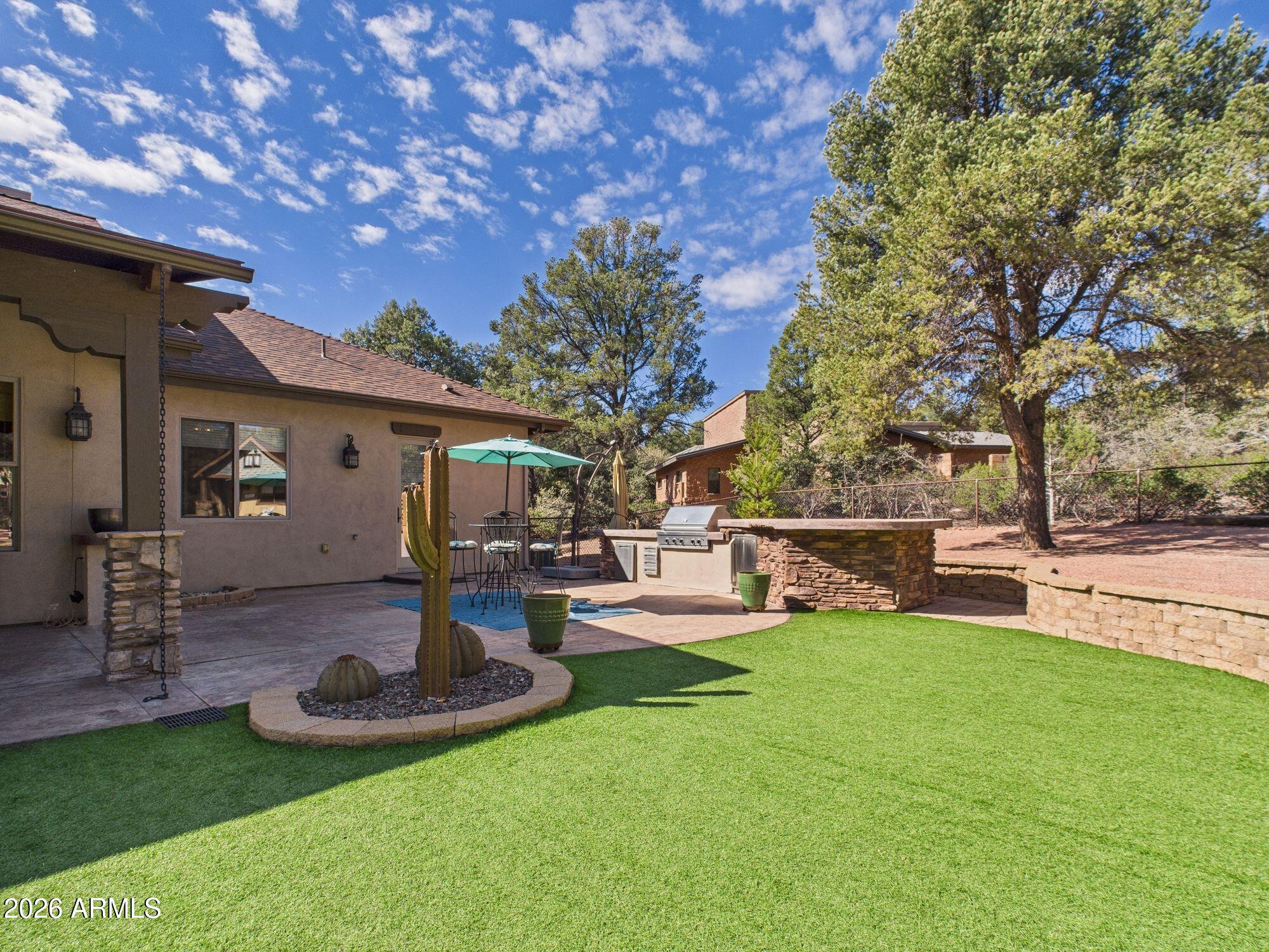 1006 West Rock Springs Circle Payson, AZ 85541 - Photo 24 of 35 a view of a house with backyard porch and sitting area