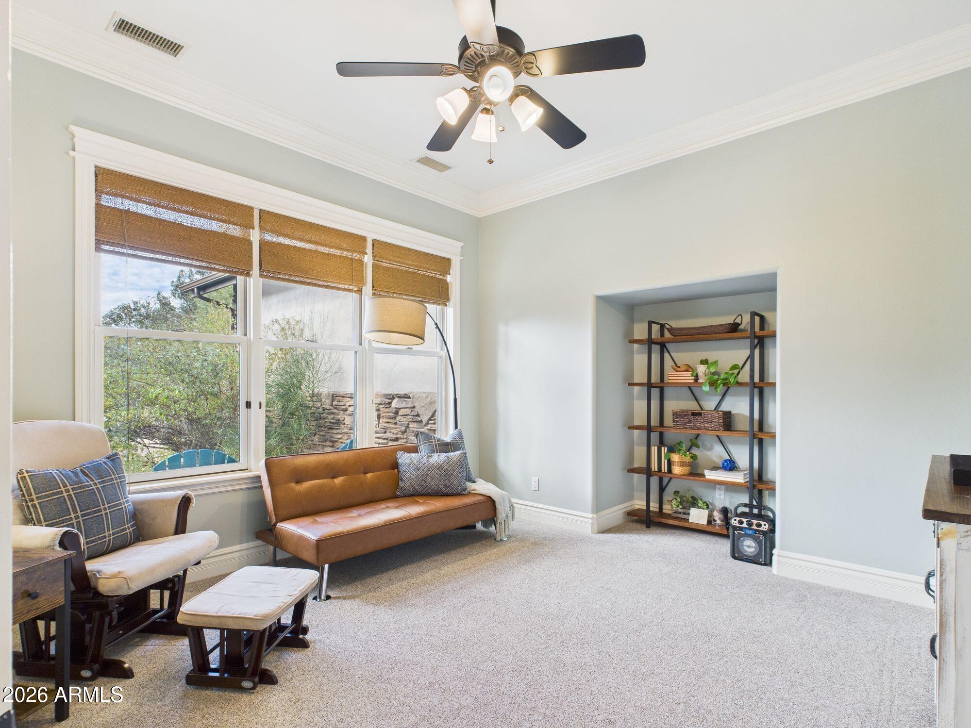 1006 West Rock Springs Circle Payson, AZ 85541 - Photo 6 of 35 a living room with furniture and a window