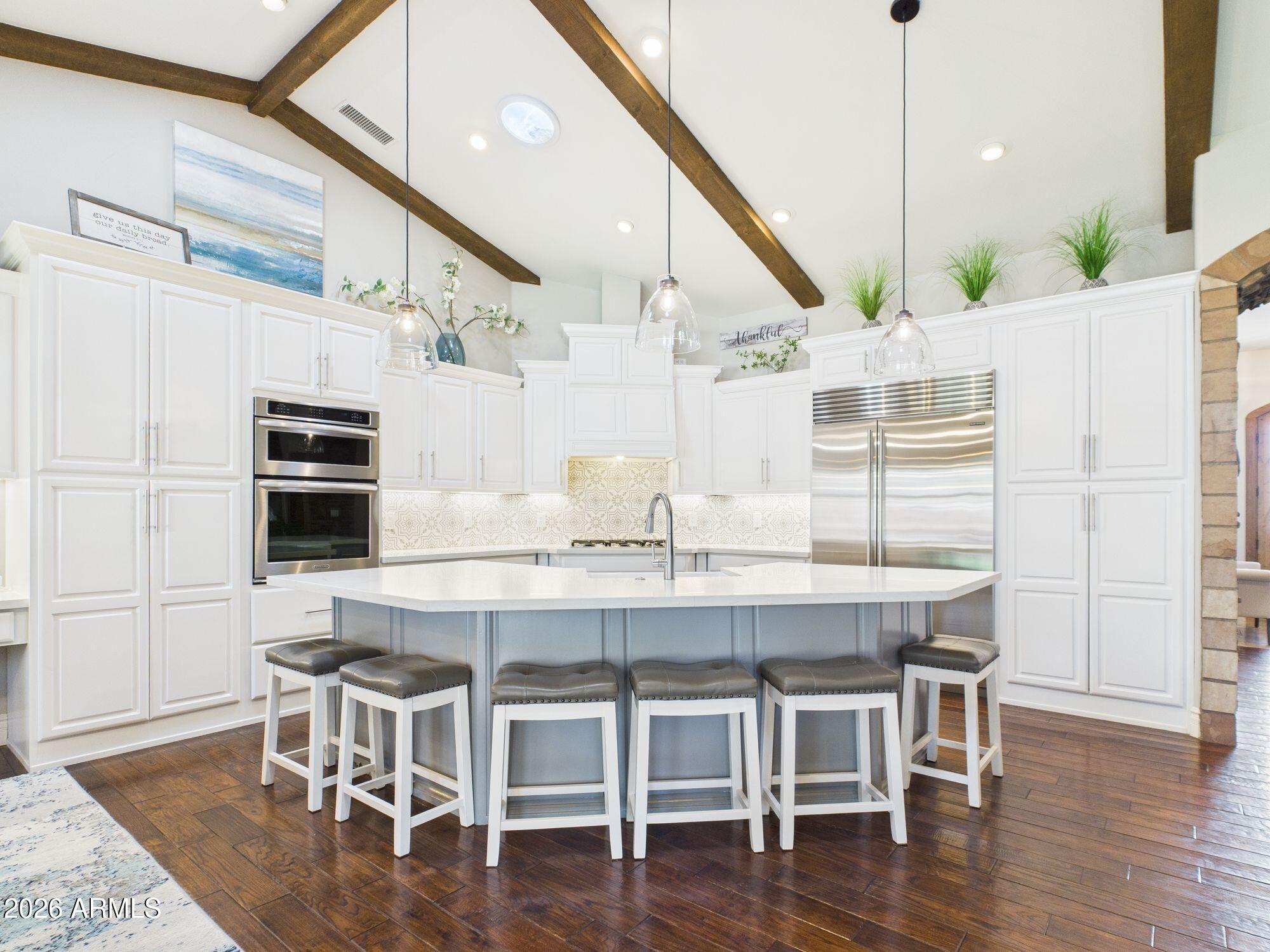 1006 West Rock Springs Circle Payson, AZ 85541 - Photo 10 of 35 a dining table with chairs and wooden floor
