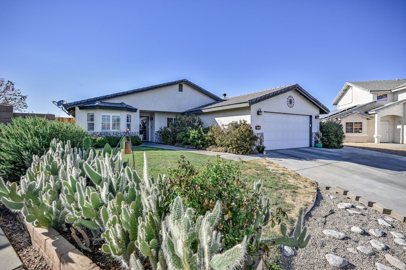 424 Marlene Court Ridgecrest, CA 93555 - Photo 1 of 38 a front view of a house with a yard