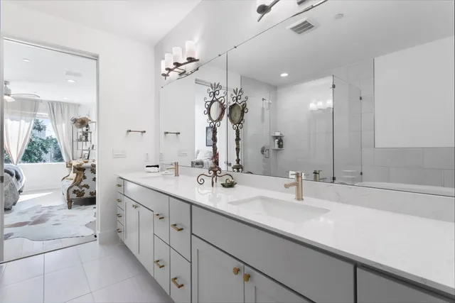 a bathroom with a bathtub and a sink