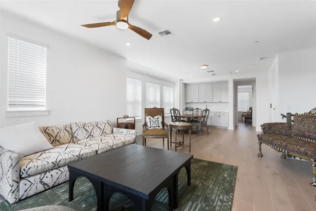 a view of a livingroom with furniture and window
