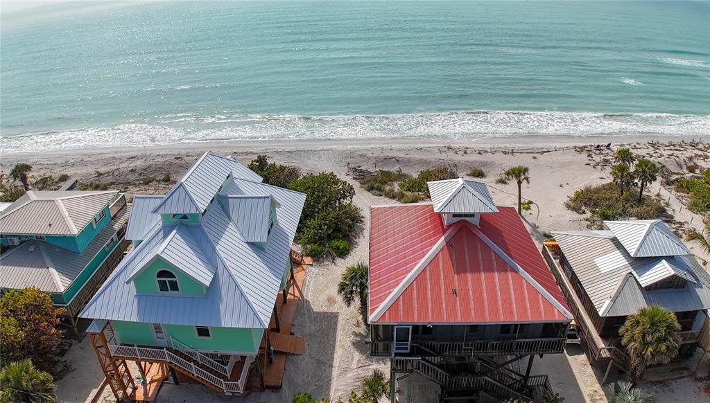 8796 Grand Avenue Boca Grande, FL 33921 - Photo 2 of 19 a aerial view of a house with a yard
