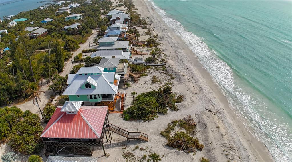 8796 Grand Avenue Boca Grande, FL 33921 - Photo 3 of 19 a aerial view of a house with a yard
