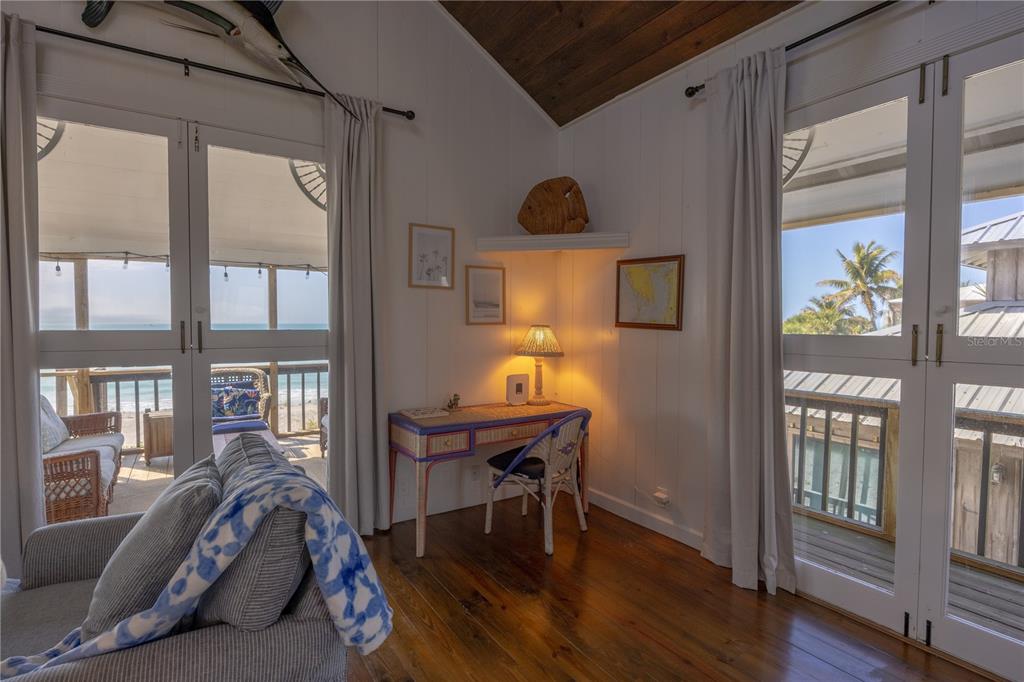 8796 Grand Avenue Boca Grande, FL 33921 - Photo 10 of 19 a living room with furniture and a window