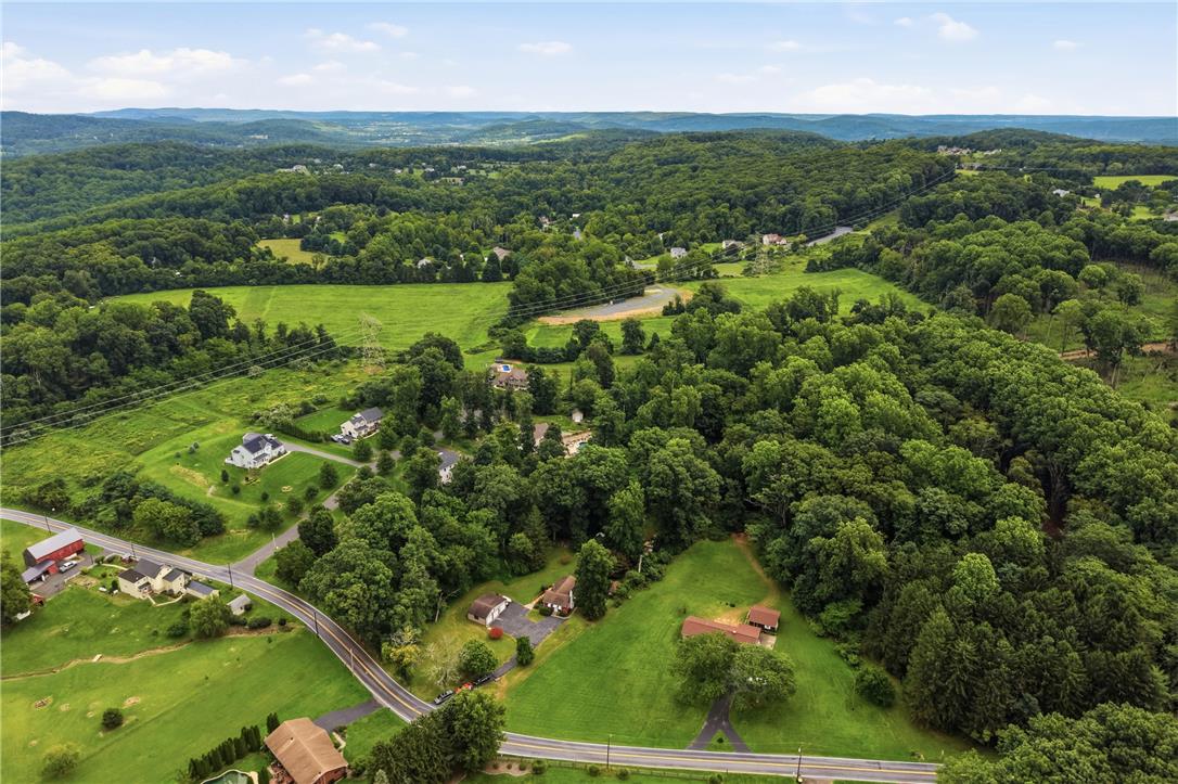 3573 Lower Saucon Road Hellertown, PA 18055 - Photo 52 of 56 Lush rolling hills and mature woodlands stretch across this expansive countryside landscape.