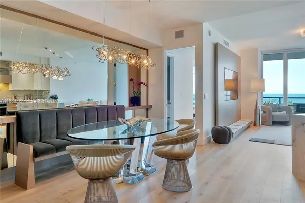 a room with furniture and a chandelier