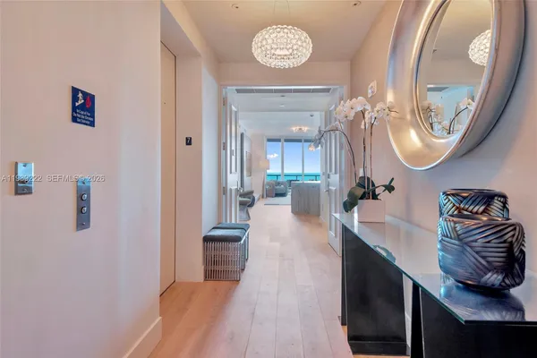 a very nice looking room with a large mirror