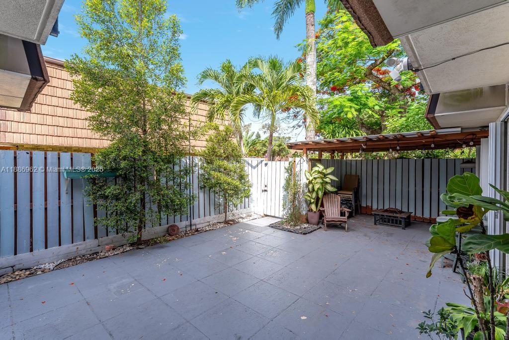 9146 Southwest 23rd Street Davie, FL 33324 - Photo 19 of 21 a view of garden with wooden stairs