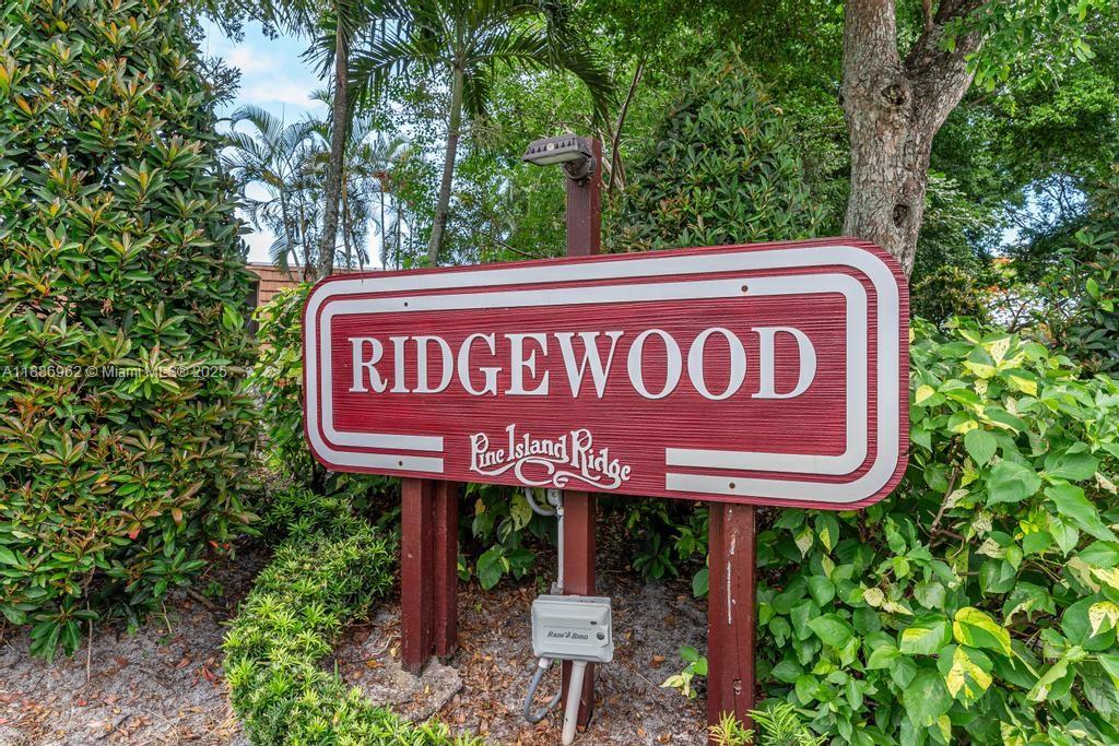 9146 Southwest 23rd Street Davie, FL 33324 - Photo 21 of 21 a sign that is sitting on a brick wall