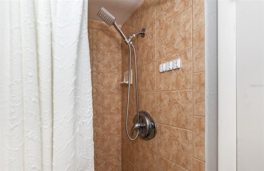 140 Columbia Road Venice, FL 34293 - Photo 26 of 30 a bathroom with a shower
