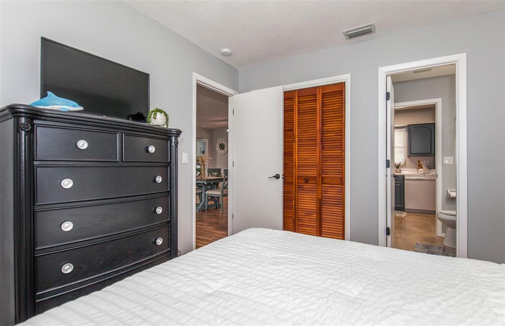140 Columbia Road Venice, FL 34293 - Photo 28 of 30 a bedroom with a bed and a television