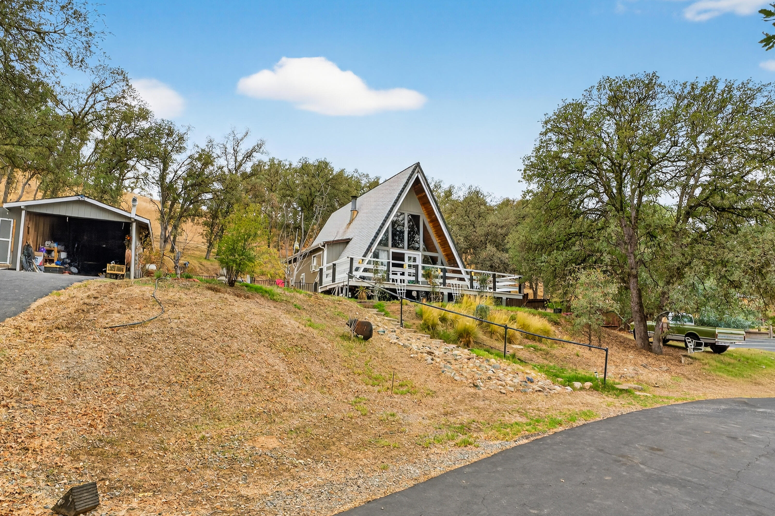 a view of swimming pool and trees in the background