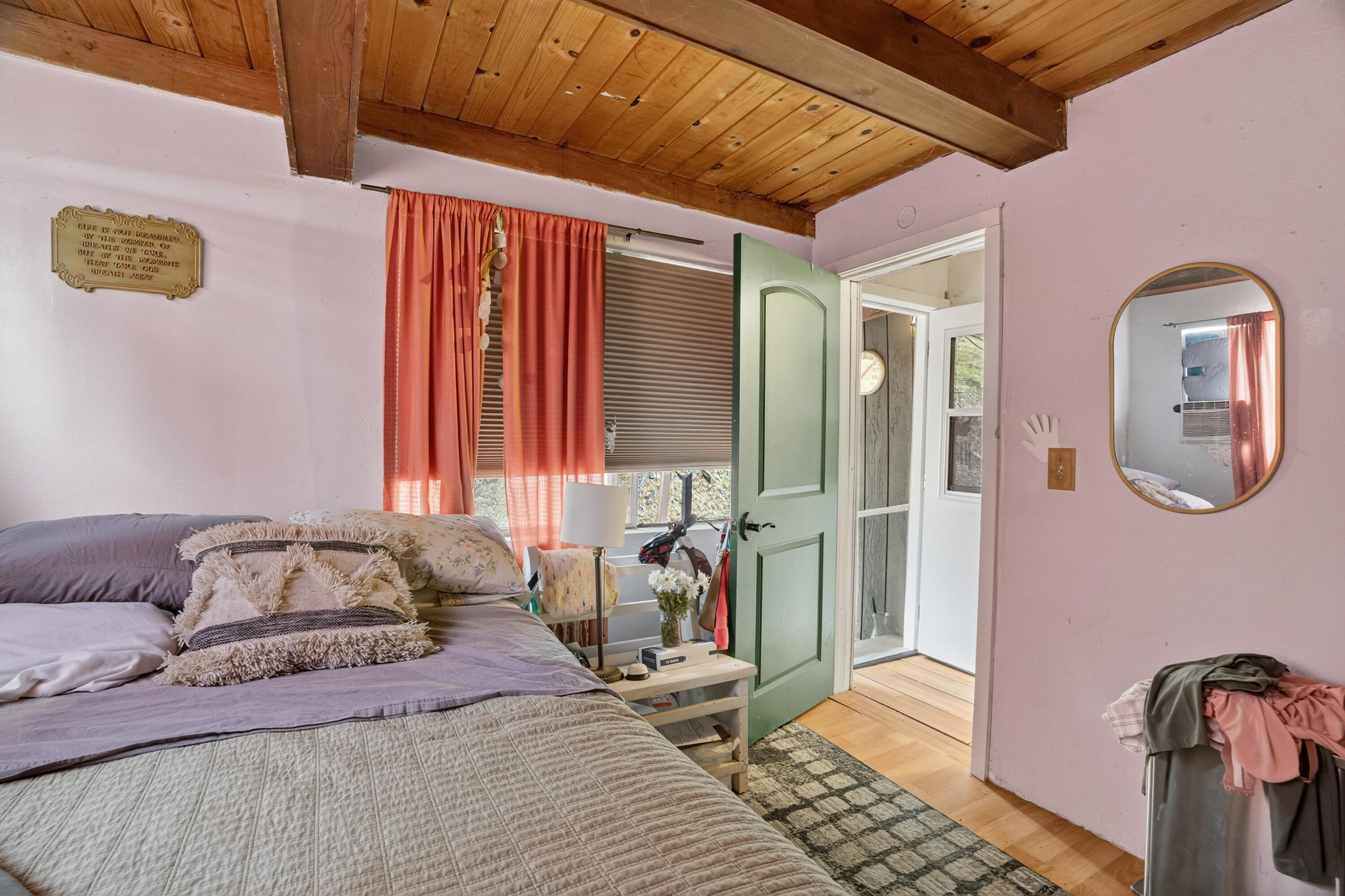 16937 Stagecoach Road Corning, CA 96021 - Photo 11 of 24 a bedroom with a bed and wooden floor