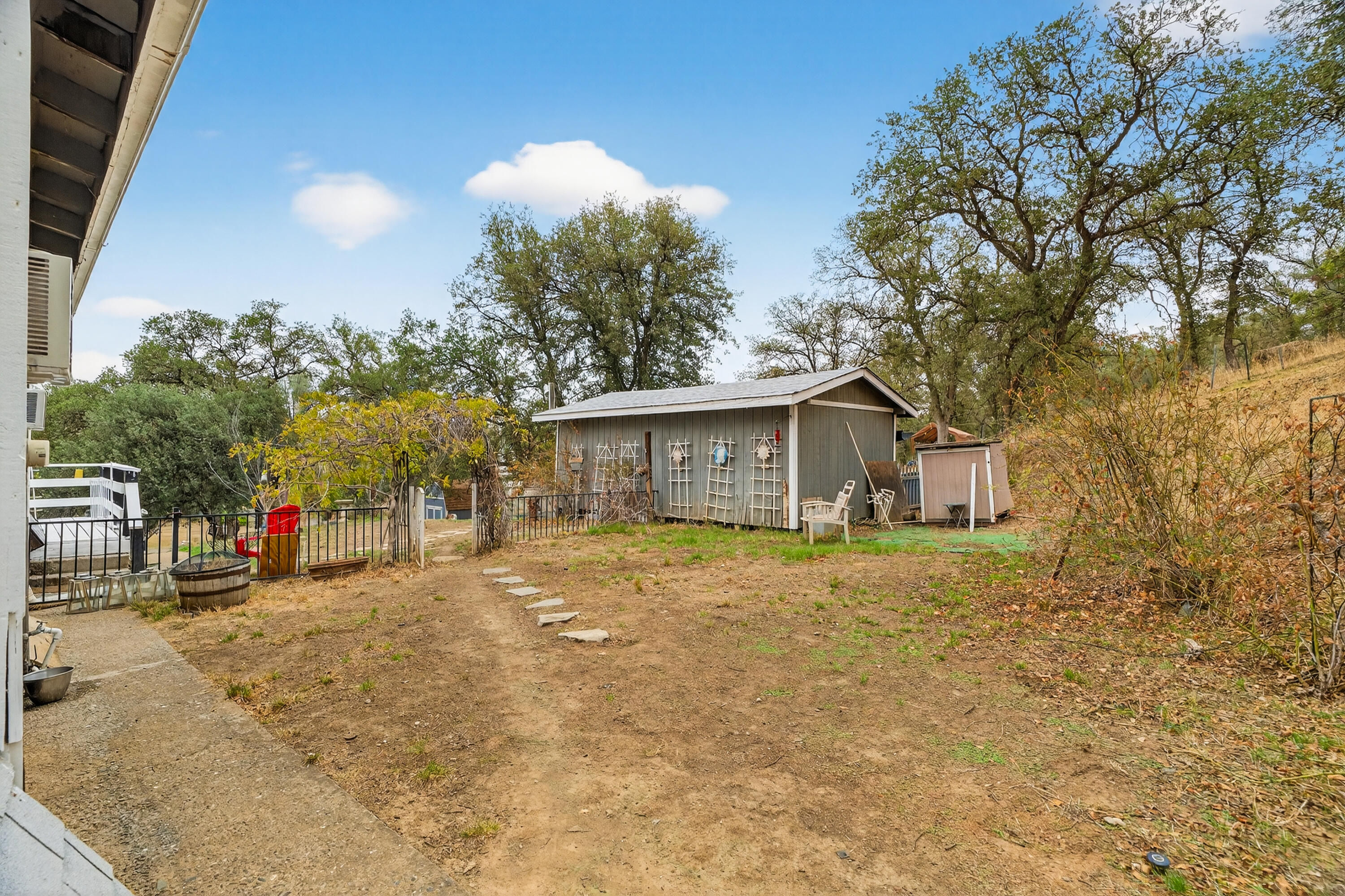 16937 Stagecoach Road Corning, CA 96021 - Photo 21 of 24 a view of a house with a yard and large tree
