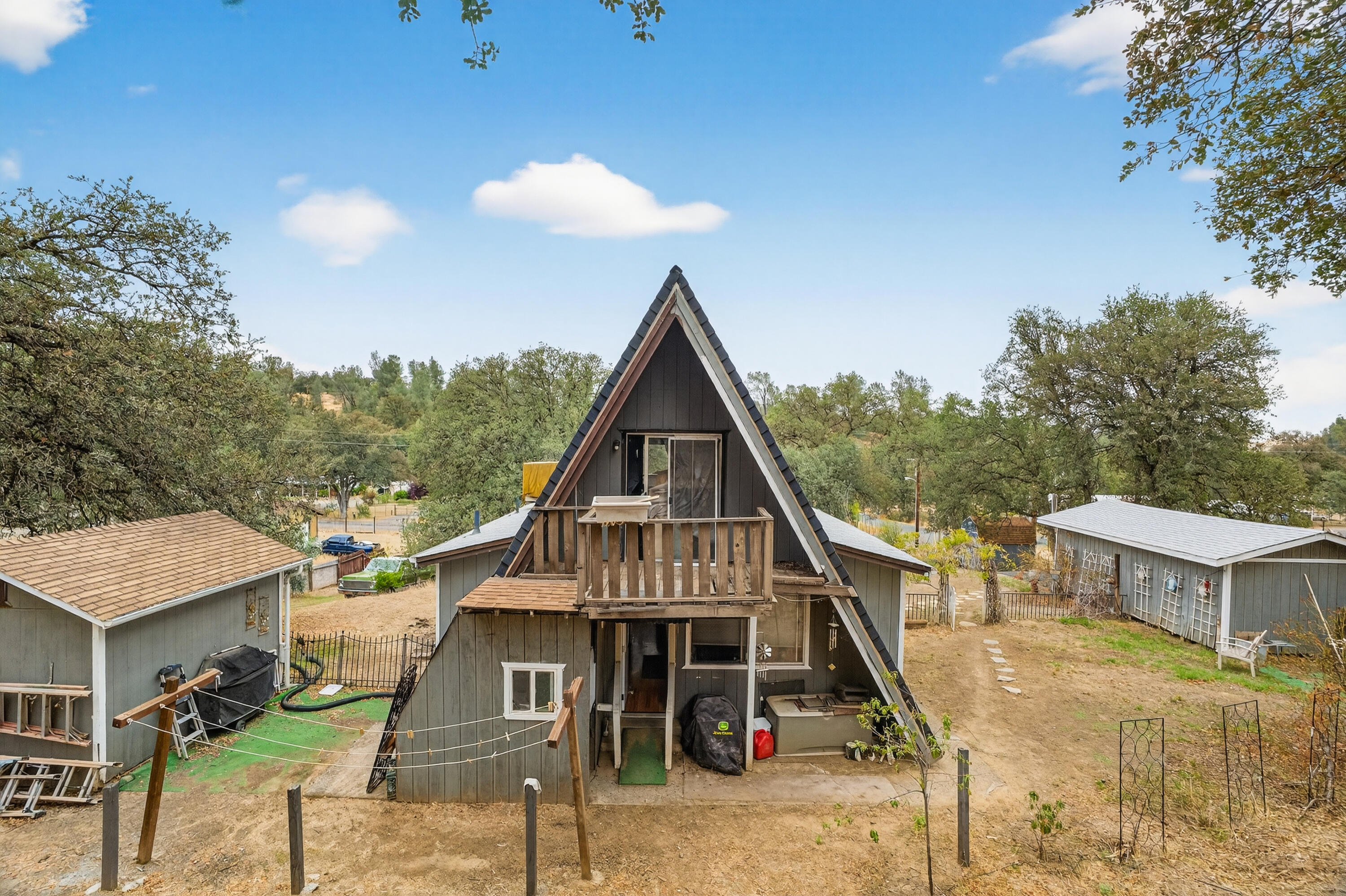 16937 Stagecoach Road Corning, CA 96021 - Photo 22 of 24 a front view of a house with a yard