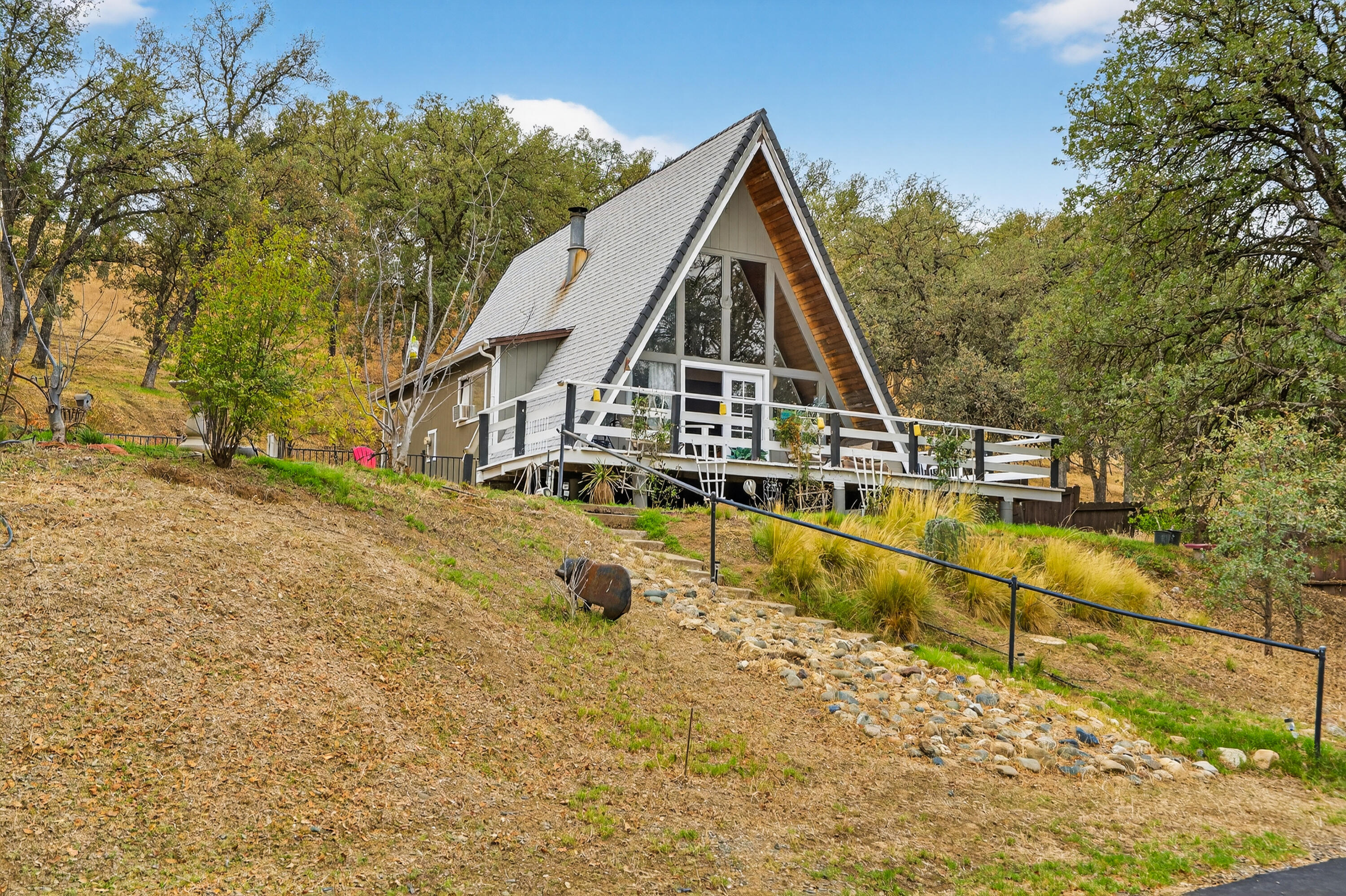 16937 Stagecoach Road Corning, CA 96021 - Photo 3 of 24 a view of a house with a yard