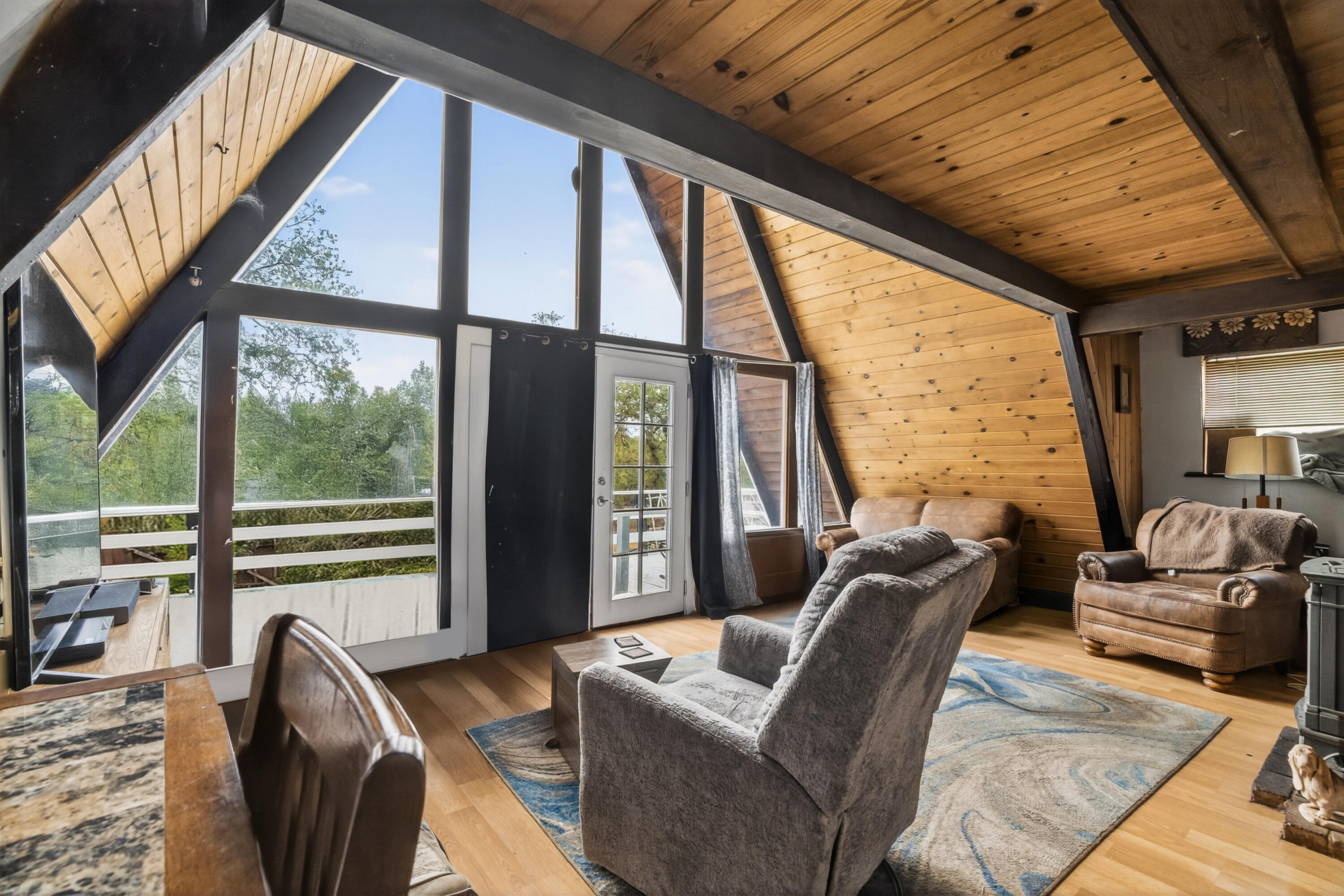 16937 Stagecoach Road Corning, CA 96021 - Photo 5 of 24 a living room with furniture and a large window