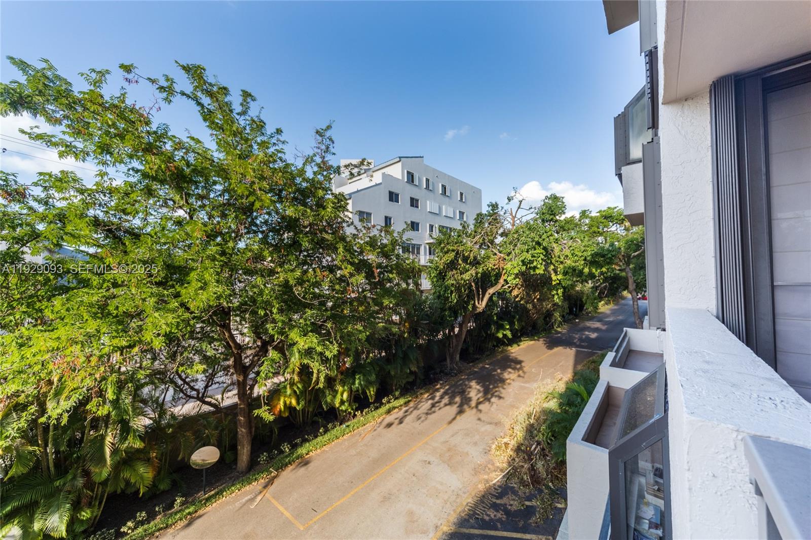 121 Crandon Boulevard, Unit 248 Key Biscayne, FL 33149 - Photo 32 of 37 a view of a garden with potted plants