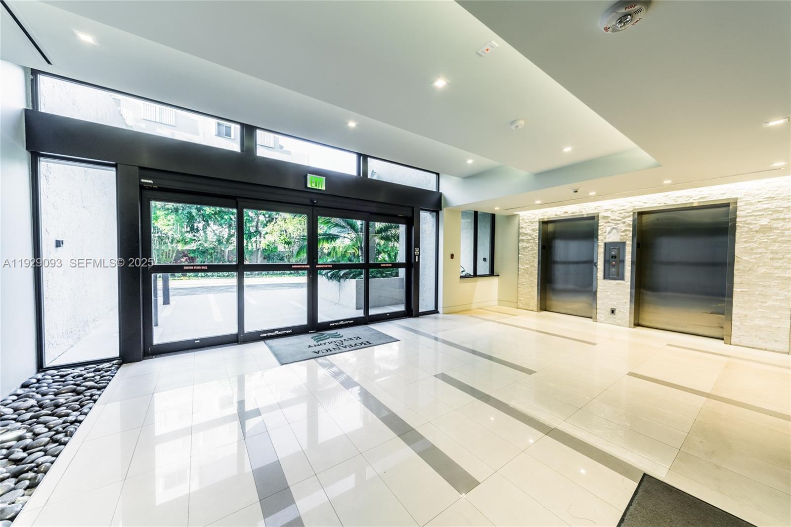 121 Crandon Boulevard, Unit 248 Key Biscayne, FL 33149 - Photo 34 of 37 a large white building