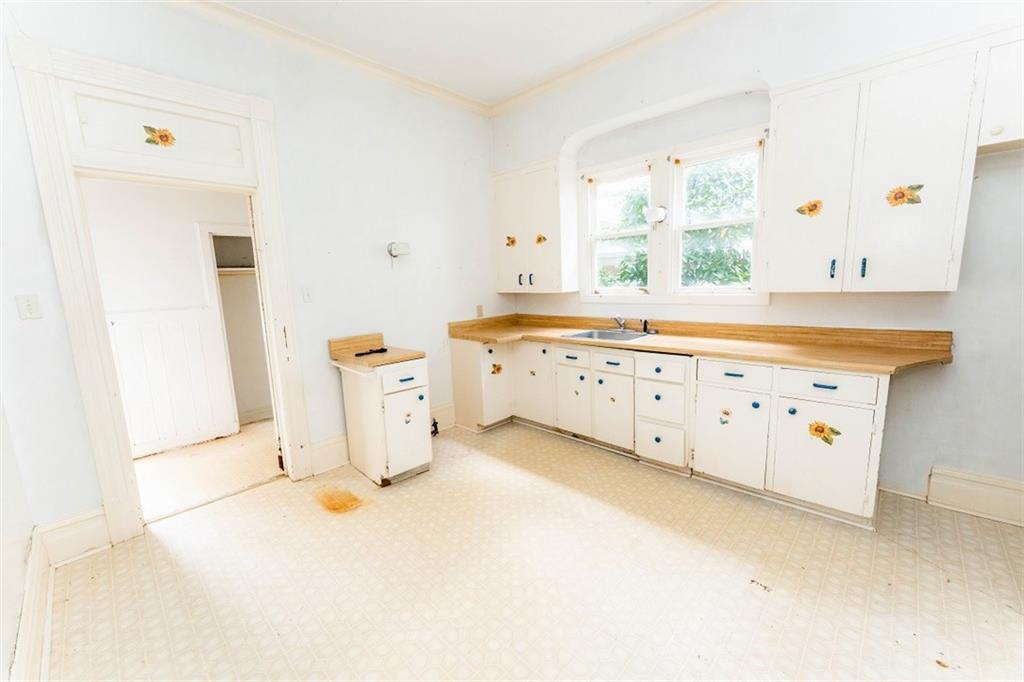 303 South 6th Street Indiana, PA 15701 - Photo 5 of 14 a view of a kitchen with wooden floor