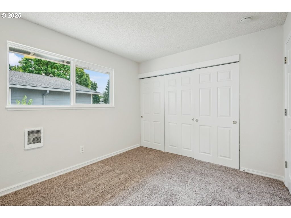 1500 Northeast Paropa Court Gresham, OR 97030 - Photo 22 of 31 a view of an empty room with a window