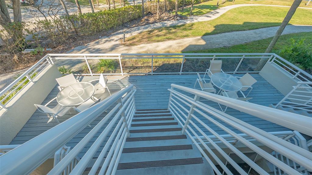 250 Sands Point Road, Unit 5101 Longboat Key, FL 34228 - Photo 21 of 42 a view of balcony with furniture