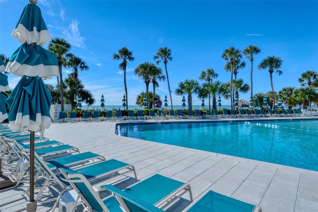 250 Sands Point Road, Unit 5101 Longboat Key, FL 34228 - Photo 28 of 42 a view of a lake with couches chairs
