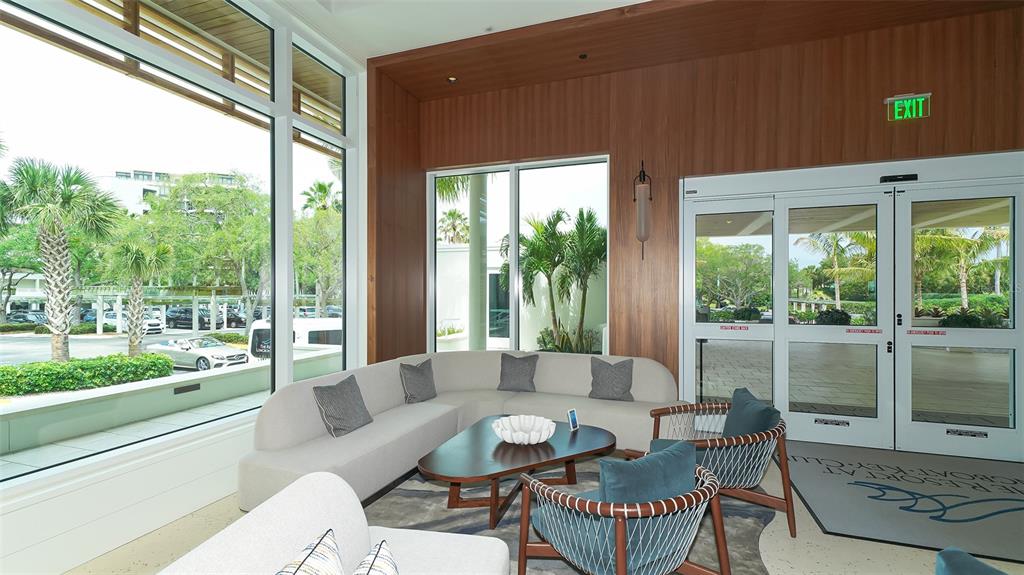 250 Sands Point Road, Unit 5101 Longboat Key, FL 34228 - Photo 33 of 42 a living room with furniture and a large window