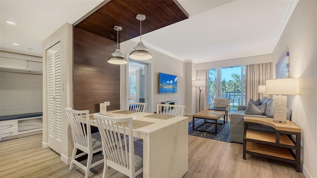 250 Sands Point Road, Unit 5101 Longboat Key, FL 34228 - Photo 8 of 42 a living room with furniture and a window