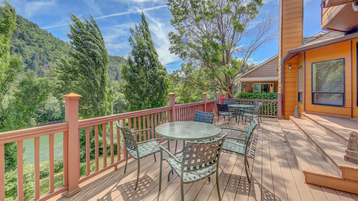 748 Riverside Avenue Gold Hill, OR 97525 - Photo 5 of 7 a view of a chair and tables on the roof deck