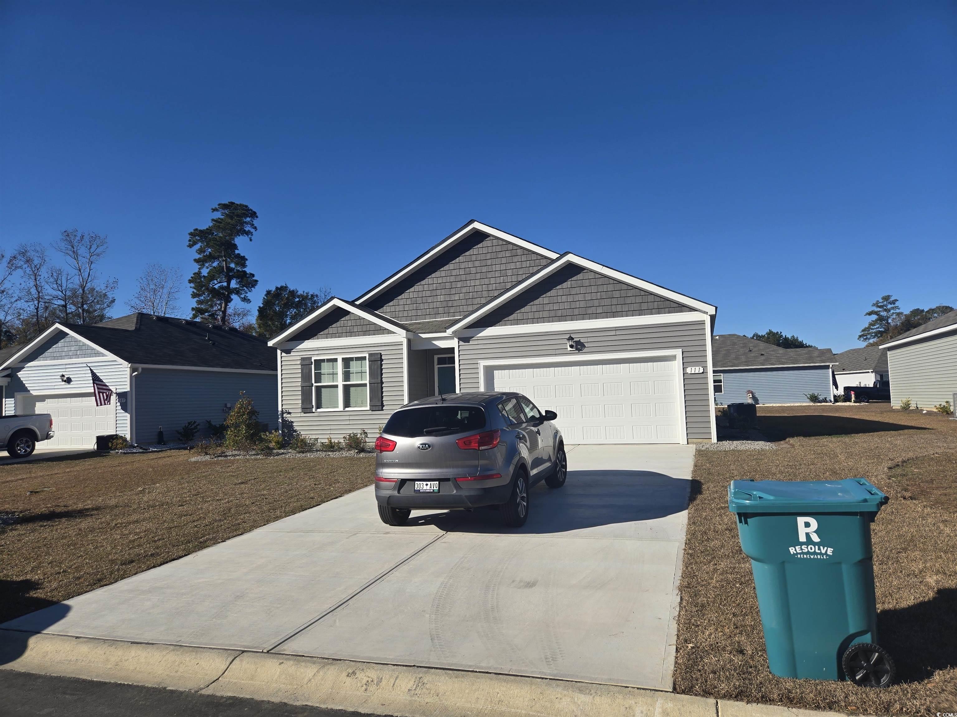 111 Cassina Drive Longs, SC 29568 - Photo 1 of 25 View of front of house with a garage