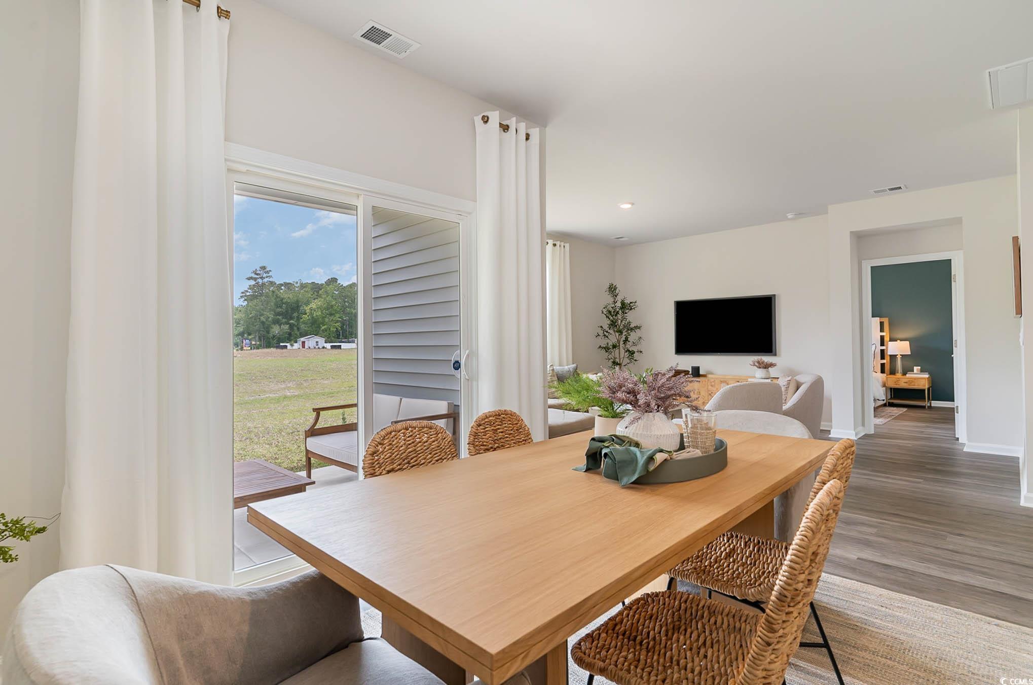 111 Cassina Drive Longs, SC 29568 - Photo 16 of 25 Dining space with hardwood / wood-style flooring
