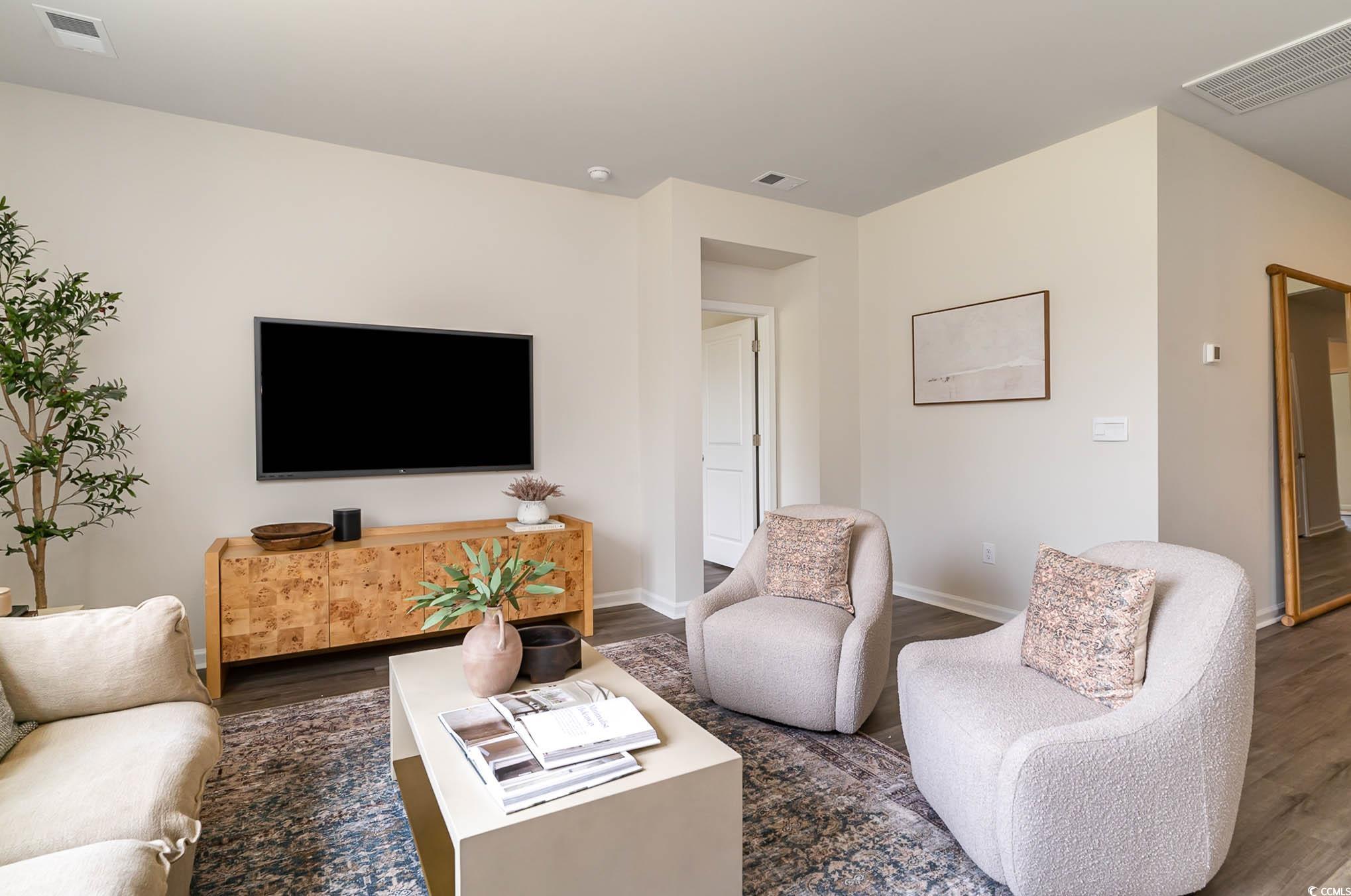 111 Cassina Drive Longs, SC 29568 - Photo 19 of 25 Living room with dark hardwood / wood-style floori