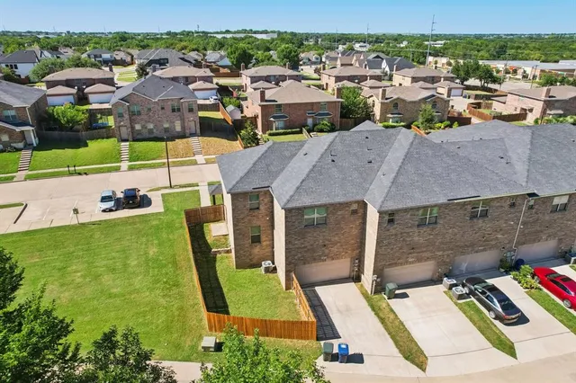 an aerial view of multiple house