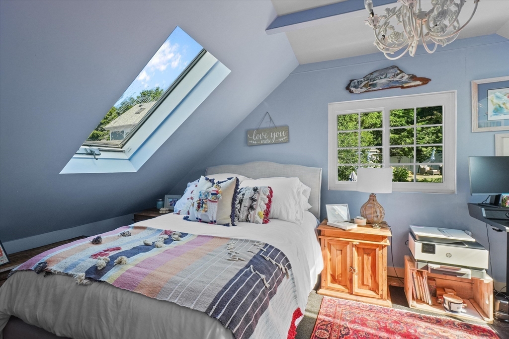 434 Main Street Amesbury, MA 01913 - Photo 17 of 40 a bedroom with a bed and a window