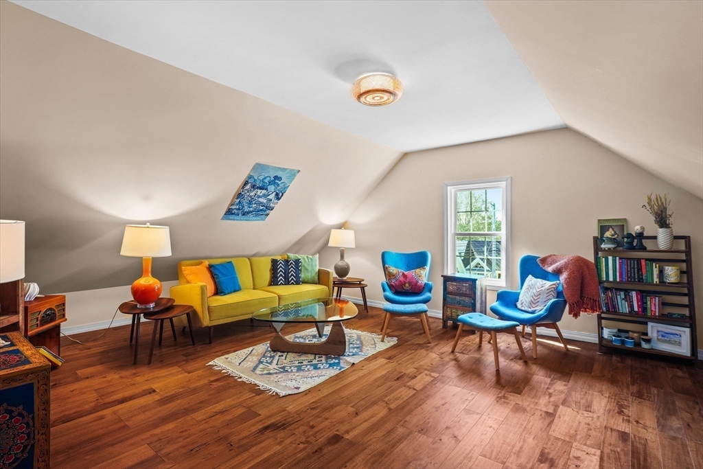 434 Main Street Amesbury, MA 01913 - Photo 20 of 40 a living room with furniture and a wooden floor