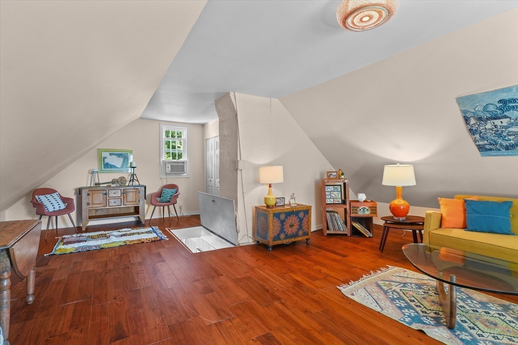 434 Main Street Amesbury, MA 01913 - Photo 21 of 40 a living room with furniture and a wooden floor