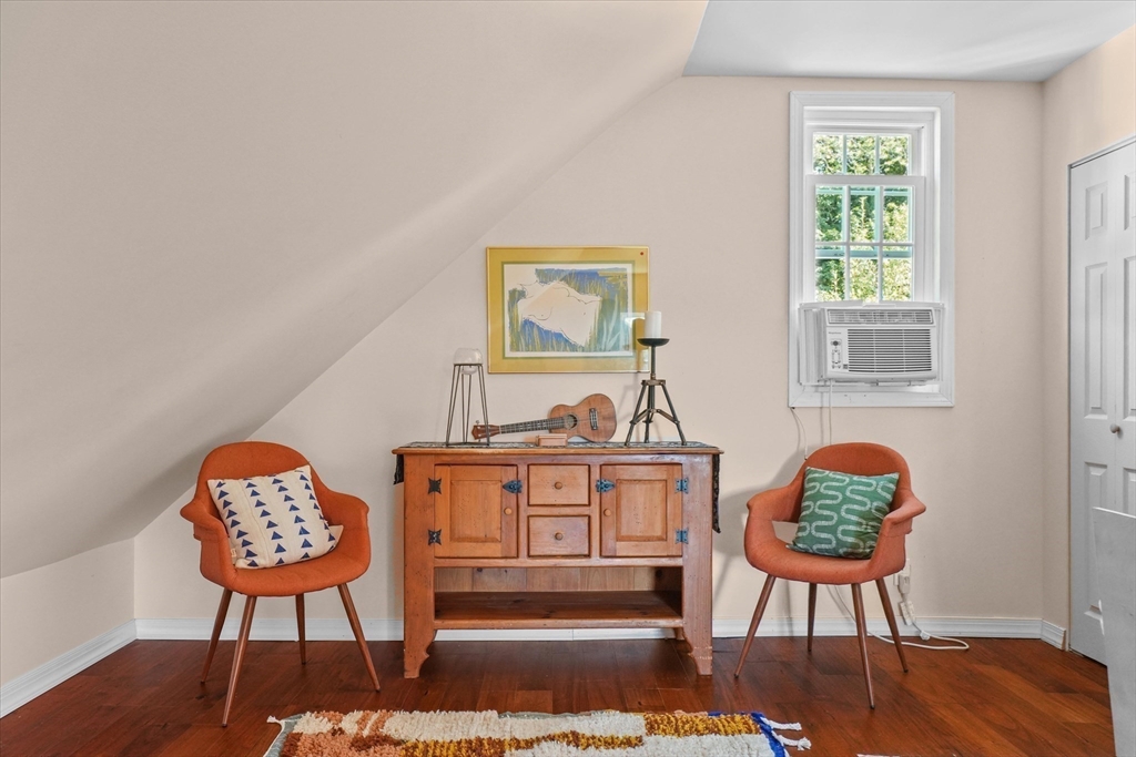 434 Main Street Amesbury, MA 01913 - Photo 23 of 40 a view of a workspace with furniture and wooden floor
