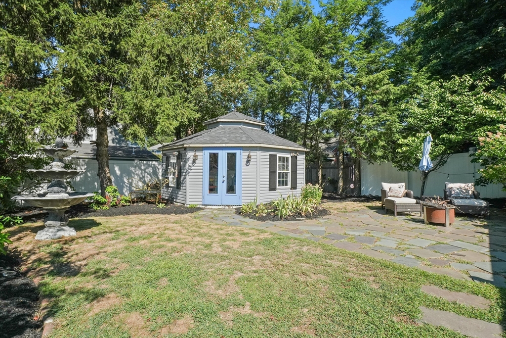434 Main Street Amesbury, MA 01913 - Photo 32 of 40 a view of a house with backyard and sitting area