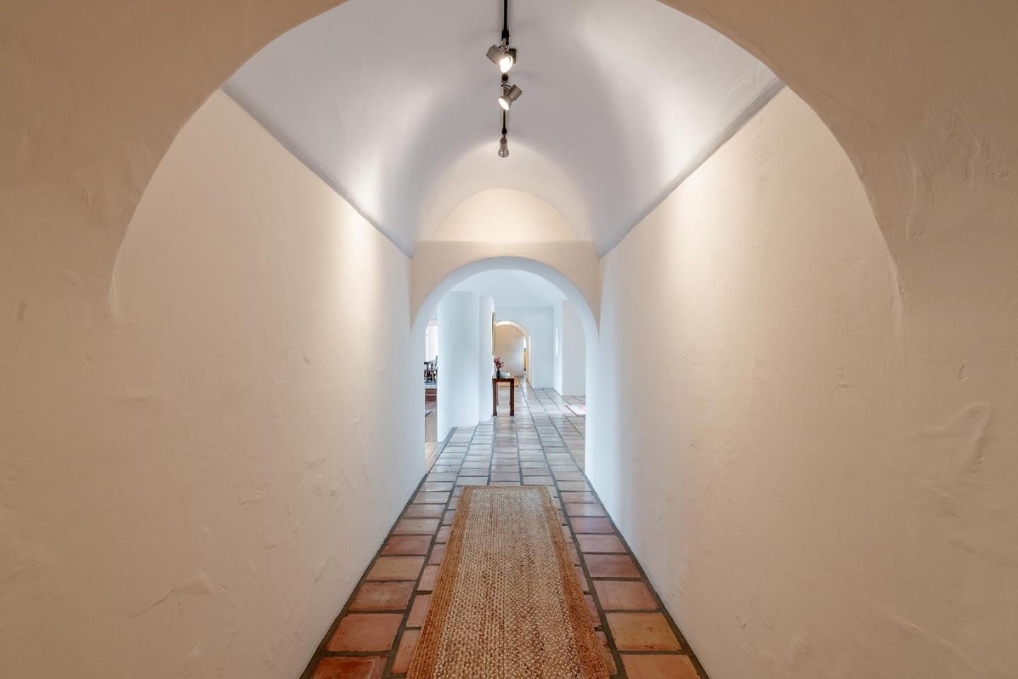 25987 Rio Vista Drive Carmel, CA 93923 - Photo 12 of 21 a view of a hallway with a white walls
