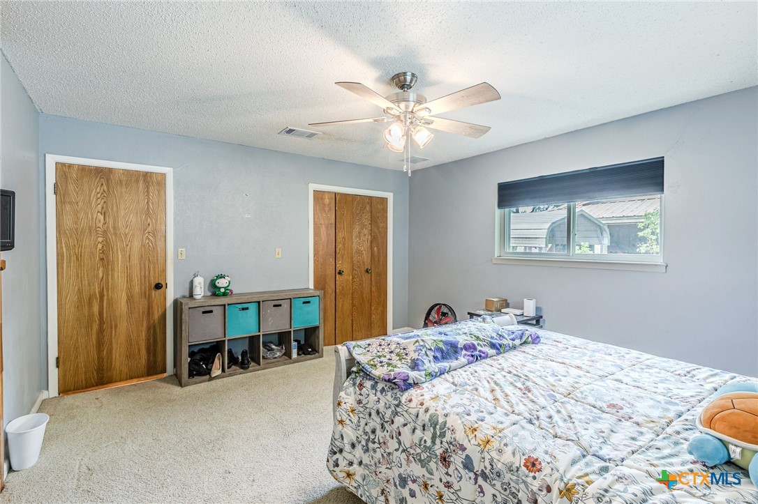 2411 Osage Road Gatesville, TX 76528 - Photo 11 of 26 Bedroom with updated flooring and natural light