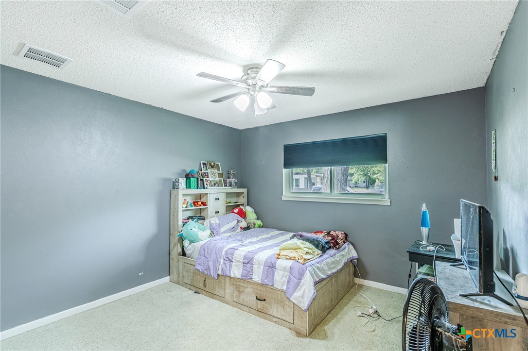 2411 Osage Road Gatesville, TX 76528 - Photo 17 of 26 Bedroom with neutral color palette