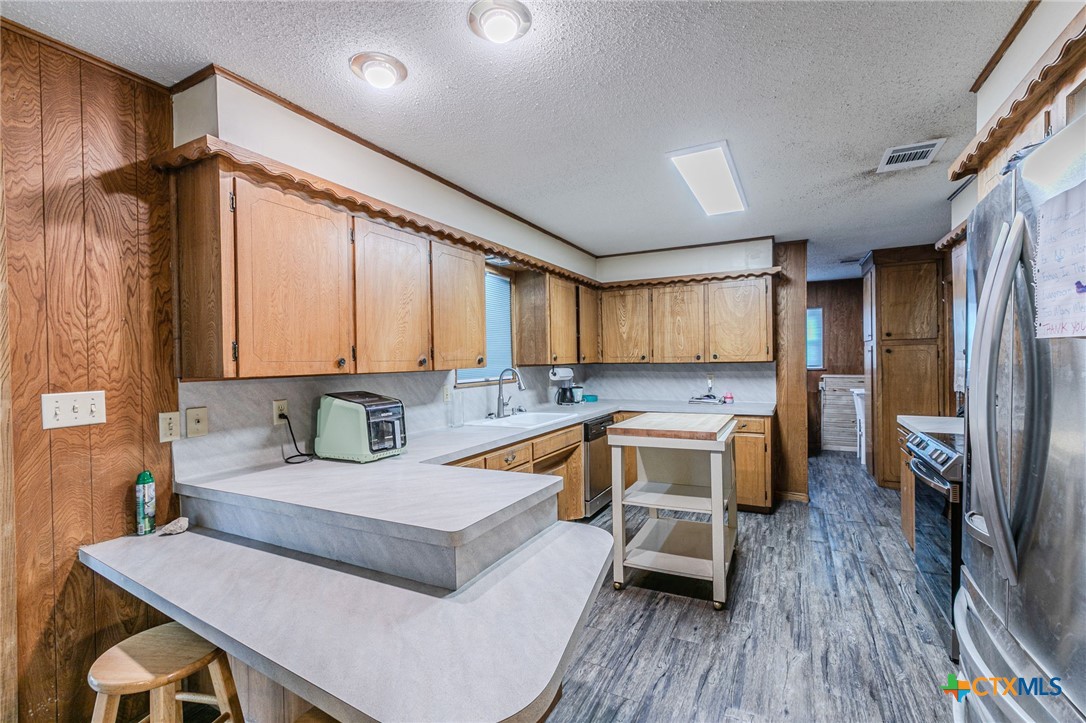 2411 Osage Road Gatesville, TX 76528 - Photo 7 of 26 Kitchen with ample cabinetry and counter space