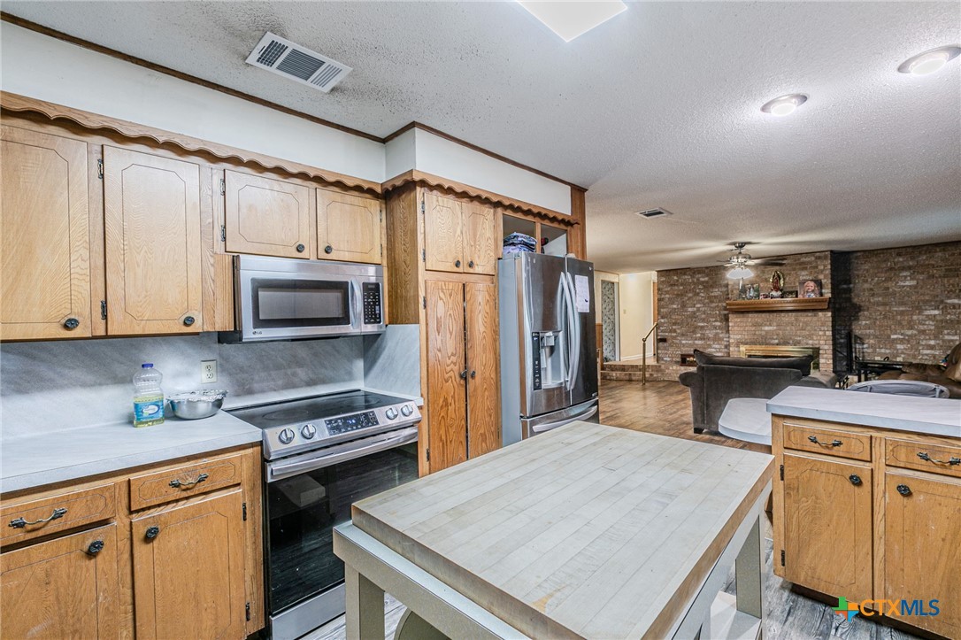 2411 Osage Road Gatesville, TX 76528 - Photo 8 of 26 Kitchen with ample cabinetry and counter space