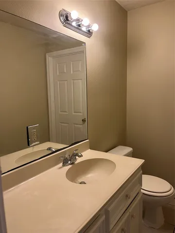 a bathroom with a sink and a toilet
